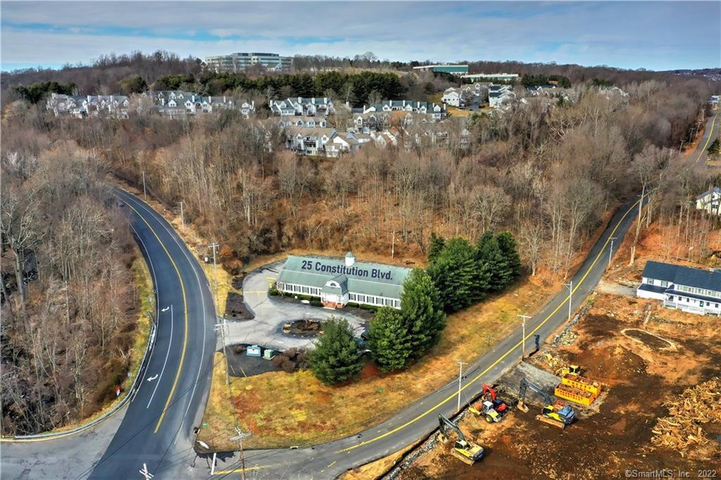 INVESTMENT OPPORTUNITY: Office space for lease in Shelton, CT - Minutes to the Merritt Parkway and within walking distance to commuter bus line. Situated on 2.84 acres in a Planned Development District bordering River Road. With 5590 SF of office space available on the main level; 4960 SF available on the lower level.25 Constitution Blvd S features: central air-conditioning, passenger elevator, generator, a wet sprinkler system, security alarm system, 7 bathrooms, and is fully handicap accessible. There is street-level parking on both sides of the building, with 40 shared spaces and 8 designated spaces. The building has a ceiling height of 8' in the main and lower level and heavy power (1600 amps). Prior use included physical therapy practice, orthopedic practice, and MRI services. The lower level has a reinforced space 17' x 18' that can accommodate MRI/XRAY equipment.Easily accessible to River Road, Route 8.