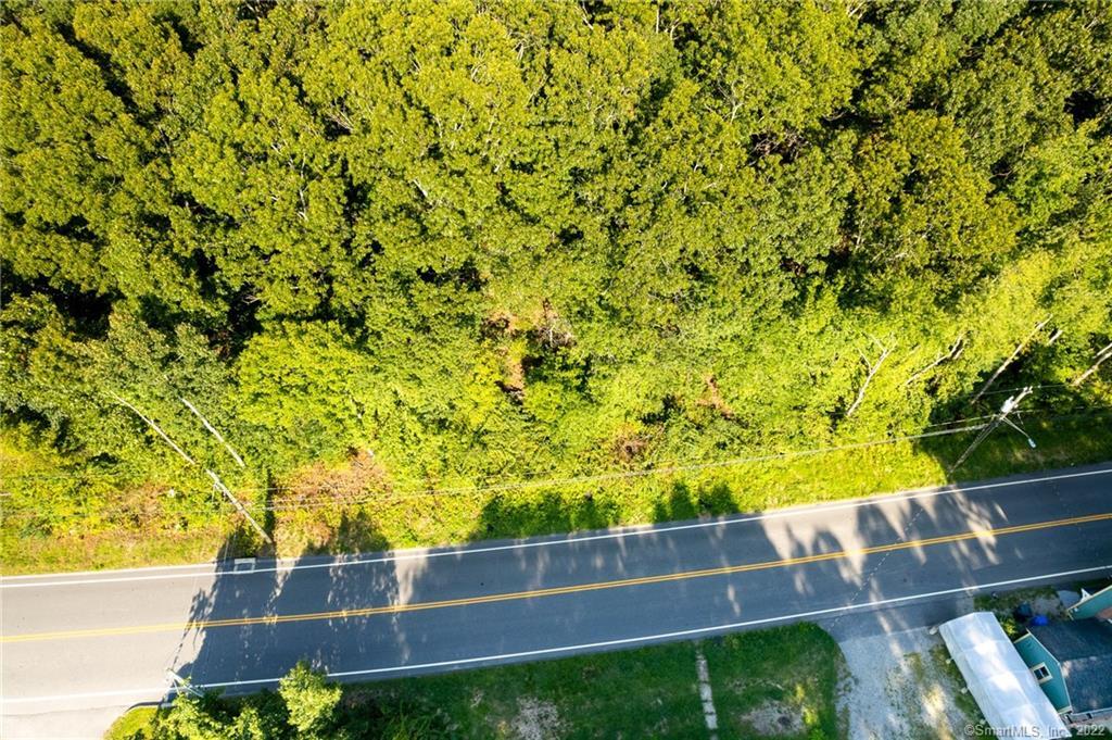 Nicely wooded approved building lot with hilltop setting and great views. Build your dream home on 4.5 acres of privacy. Minutes away from Buttonwoods and Pachaug pond.