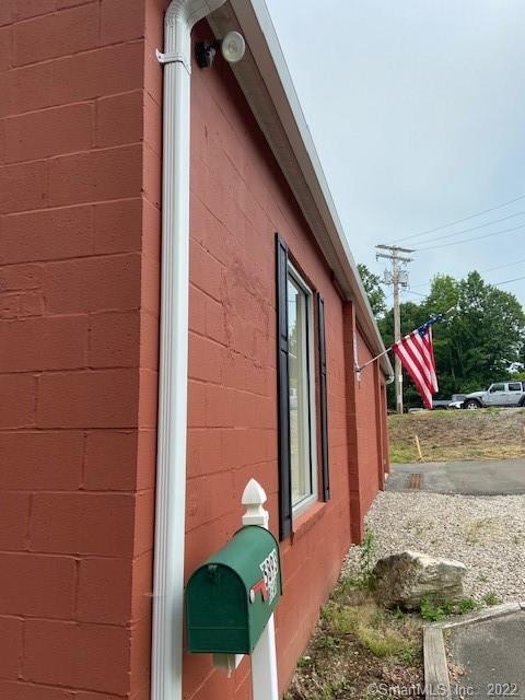 Combination office / garage building in pristine condition located behind a retail center across from Trumbull Town Hall. Perfect for construction or landscape operation. Nicely finished, 2, 400 sq. ft. total with added 2, 400 sq. ft. attic space ready for finishing. Garage is clean with overhead door and mechanicals and roof in good condition.15, 900 cars per day per CT DOT