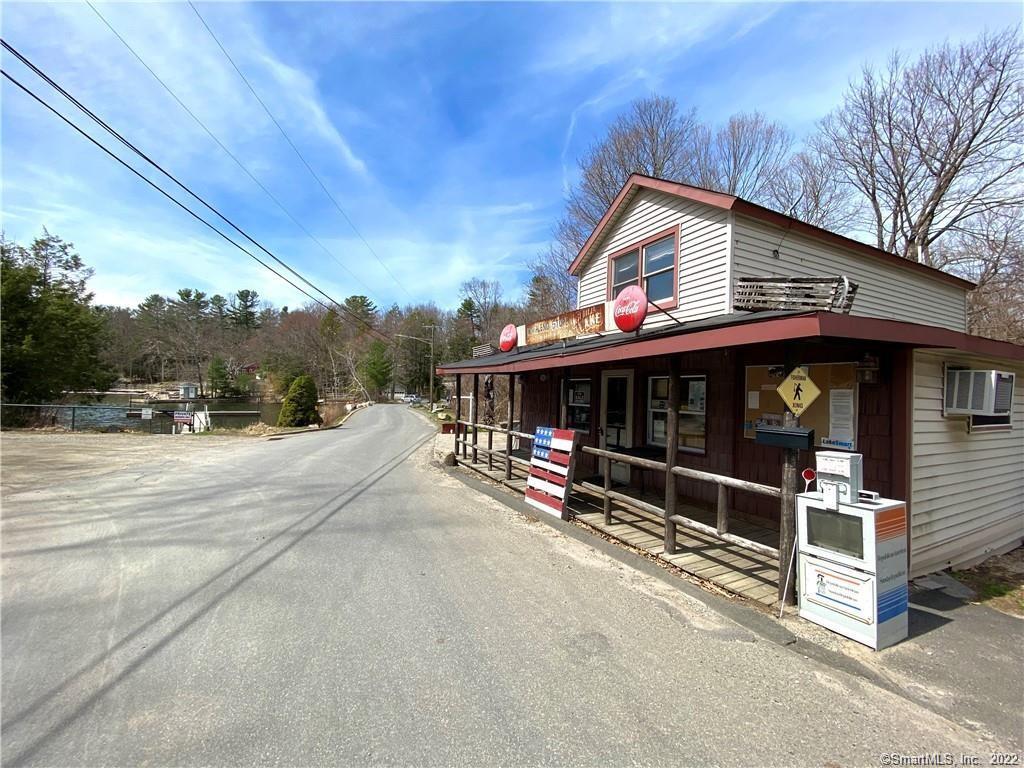 Plenty of upside for this West Hill Lake property located adjacent to the West Hill Pond boat launch. Established in 1900, this historic gem can be easily restored by a new energetic owner. Endless, seasonal opportunities such as a general store with groceries, a deli, ice cream, ice, kayak rentals, bait shop, etc.Minor renovations would get the commercial space up to snuff and opened. The property also has a two bedroom apartment upstairs that MUST be occupied by the store owner. This is perfect for a young family that would like to run the business while living on the lake all summer. This listing will be unavailable for viewing during the winter months, should there be significent snow fall.