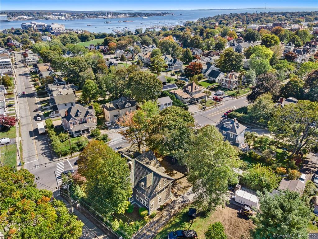 This majestic Queen Anne was impeccably and professionally restored over the last 5 years. All of the original charm and character has been maintained during this amazing transformation. This historic home was built by William Darrow in 1905 and he was president of Darrow & Comstock Ships Chandlery supplying whalers, yachts and steamers. The 3rd floor is a full apartment which does connect to the main home if in-law or live in help quarters are desired or it can be used as a completely separate income producing apartment and shut off from the main home. There are so many potential uses for this amazing property. Single family residence, multi family residence, commercial office property, bed and breakfast and many more. For more information on the restoration and rich history visit our facebook page at https://www.facebook.com/mandobella.ct