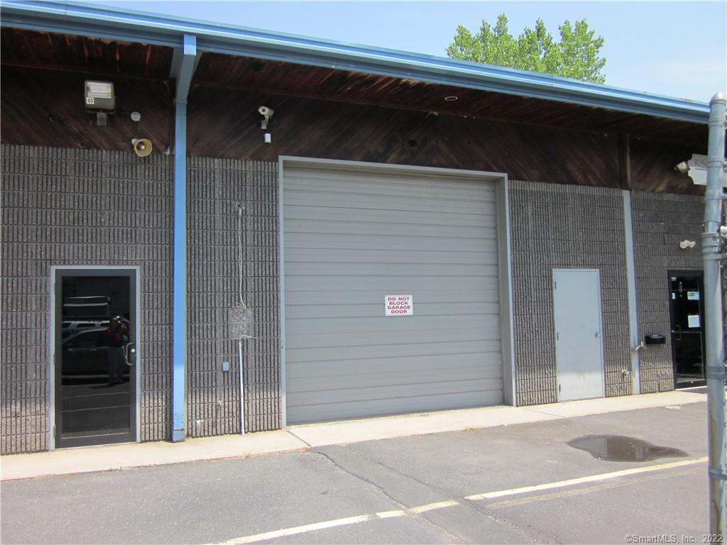 Space includes 1250 SF garage area. 12 x 12 overhead garage door. Good location for service establishment, wholesale business, repair services, small contractor, small distribution, or small manufacturing. Zoned general business.