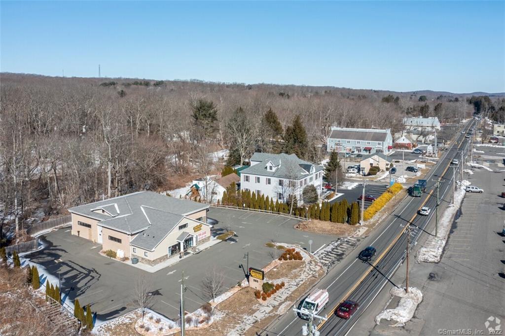 Incredible opportunity for auto, service, sales or alternate restaurant use.4, 680sf auto repair shop located 1.5 acres on busy Main Street, Monroe, constructed in 2014.2 bay auto garage formerly used by Meineke Car Care Center. Situated on 1.5 acresTwo, 14x12 overhead doors allow for drive through service, 6 lifts with the possibility of adding a 7th. There is a waiting room, two ADA lavatories, one in the waiting room, the other in the shop area. 2 small private offices adjacent to the garage service area with propane heat. Thermopane windows, 400amp service, 3-clean burn oil heaters, central air in reception area, city water and septic. Paved parking lot offers 28 parking spots.18, 900 cars per day per CT DOTTaxes: $20, 144 (July 2022  June 2023Option to lease for $9, 000/ month