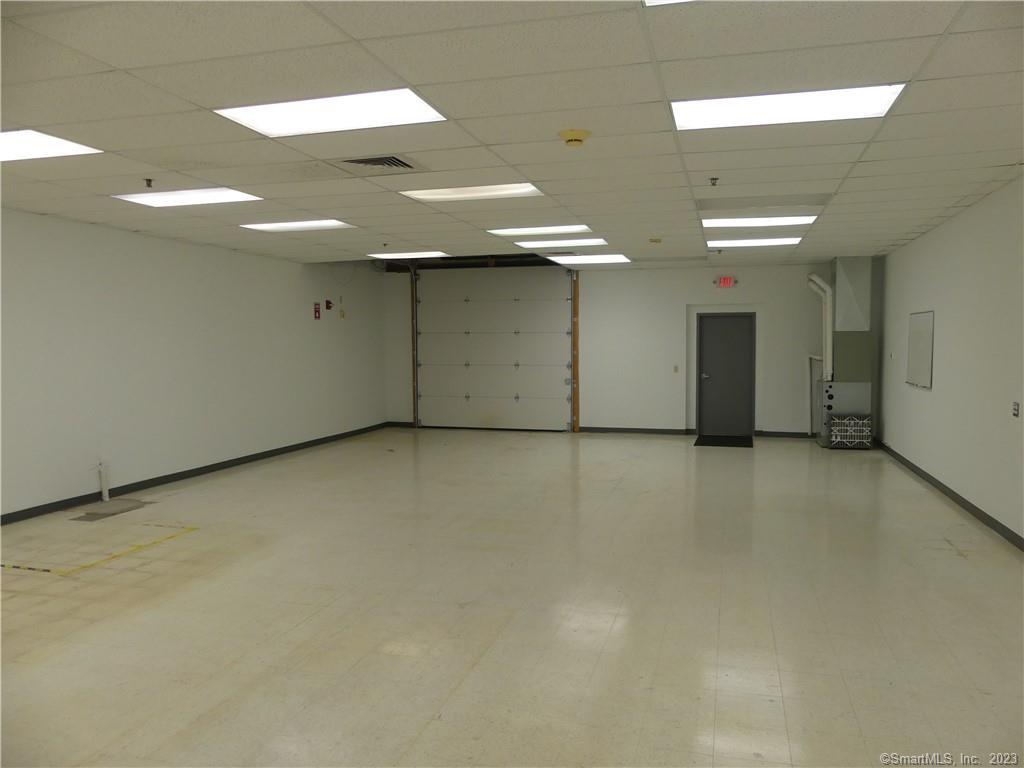 2400 sq ft of space with 2 overhead doors and a loading dock. Space is currently 30x80 and wide open. also there is another 1418 sq ft of office within complx,  Close to all major highways and 1/2 mile off Route 9 exit in Berlin. Build out the space to meet your needs. Plenty of parking.