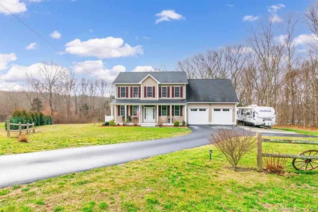 Please join us on Saturday, 1/20, from 11AM - 1PM to peruse this immaculate 2016 colonial that offers the perfect blend of modern upgrades and classic charm! Situated on a quiet, dead-end road in a desirable area of Ledyard. This home boasts 4 bedrooms, 2.5 bathrooms, and a private backyard view that will take your breath away. As you enter, you will be greeted by hardwood floors and main staircase. At the top of the stairs you will find new carpets throughout the second floor. The sellers have made numerous upgrades, including - new fixtures, lighting, and supplementary heating to make this home move-in ready. The private master suite features a large walk-in closet, a spacious bathroom with jetted tub and separate shower. For added convenience, the laundry hookups are on the second floor. Plus, enjoy reduced electric bills with a leased solar system that currently offers over 100% offset of your electricity! The small fenced-in space is perfect for a dog or children, and the garden beds provide a great opportunity to satisfy your green thumb. A generator set-up is also present for added peace of mind. Schedule your showing before it's too late!