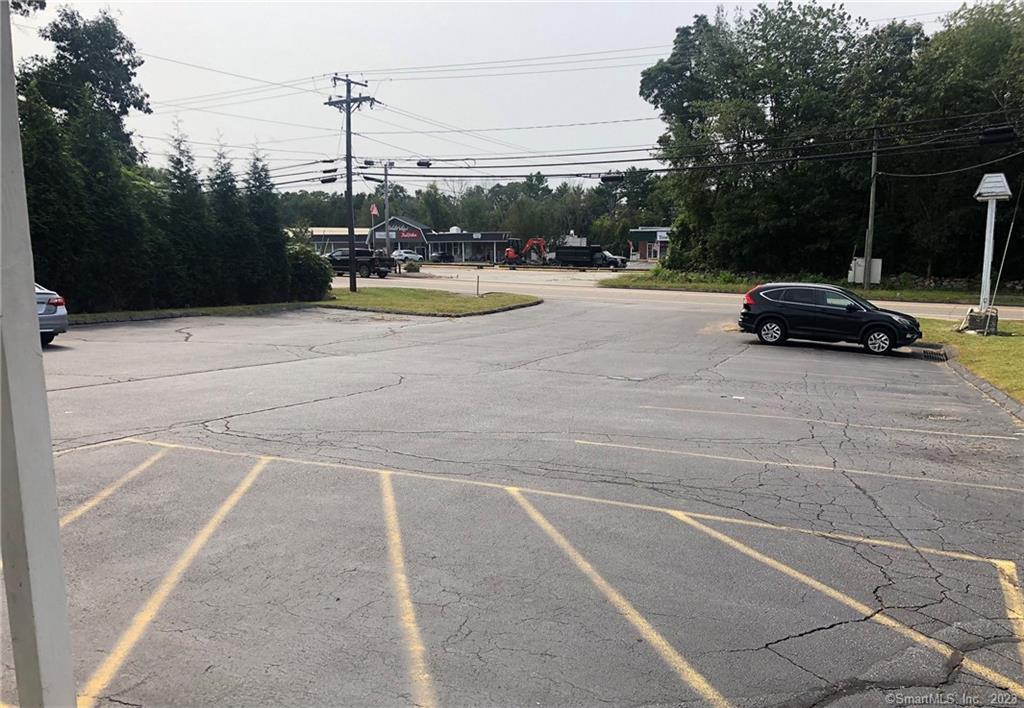 Now available, located in Ledyard Center, across from Holdridge Home & Garden, 475sf Office/Retail space for lease on 2nd floor @ $425/mo plus electric. Additional space of 700sf is also available for lease.Located on 0.49 acres with 100' road frontage. 24+/- parking spaces. 5, 600 Average Daily Traffic counts. Zone LCV1. Septic and public water; electric heat.