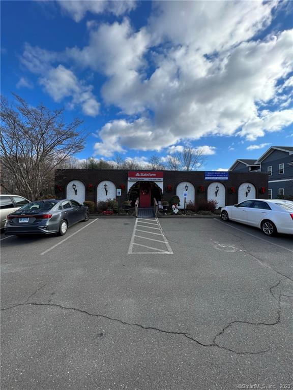 In the heart of Cheshire, this great walk-in office space facing route 10 is located in a busy area close to the Cheshire Historic District, Cheshire High School, shops and restaurants (Stop & Shop, Big Y, Starbucks, Dunkin Donuts) with ample foot traffic and plenty of parking. 25, 000 Cars per day offer great visibility. This approximately 1200 square foot space offers an idea space for medical professionals. charming foyer, large reception room, and multiple treatment rooms/offices, with no other common area charges. This space includes 3 exam rooms, 2 offices, 2 bathrooms, and large reception area for staff. With handicap access, no cam charges and telephone system in place, this office would be an ideal location for a health, finance or care professional. Benefiting from a central position along a vibrant commercial corridor convenient to I-691, 84, route 5/15 and bus routes in a highly affluent, densely populated area, this is a fantastic, affordable space in a great location.