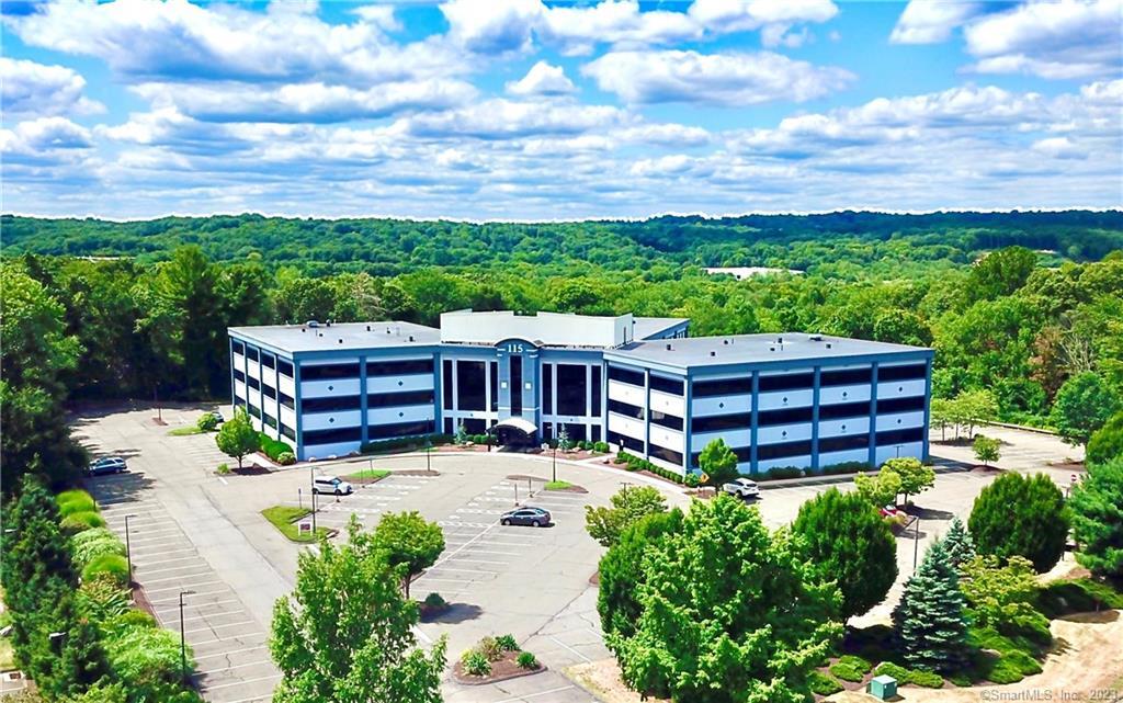 2, 398 sf custom designed corner office that was formerly a dental office. Has plumbing and lines for dental or related use. The layout consists of a waiting room, open reception areas with granite counters and cabinetry, track lighting. The open office area consists of five dental stations. There is a private exam room with sink and cabinets. An open lab area leads to a small kitchen with refrigerator and wall cabinets. The unit is wired for a sound system, there is a private office which has additional wall cabinetry and file area. The unit has its own lavatory with a new toilet. The unit features LED lights, solid wood doors, sprinkler system and central air conditioning. The flooring is ceramic tile throughout. The unit is ideal for dental, medical or professional office use.The Trumbull Professional Center is one of the most attractive locations currently available in Connecticut's Fairfield County. Set on 7.4 acres, the facility offers a combination of corporate elegance combined with efficient design.Conveniently located 1/3 mile from the intersection of the Route 25 Expressway and Route 111.