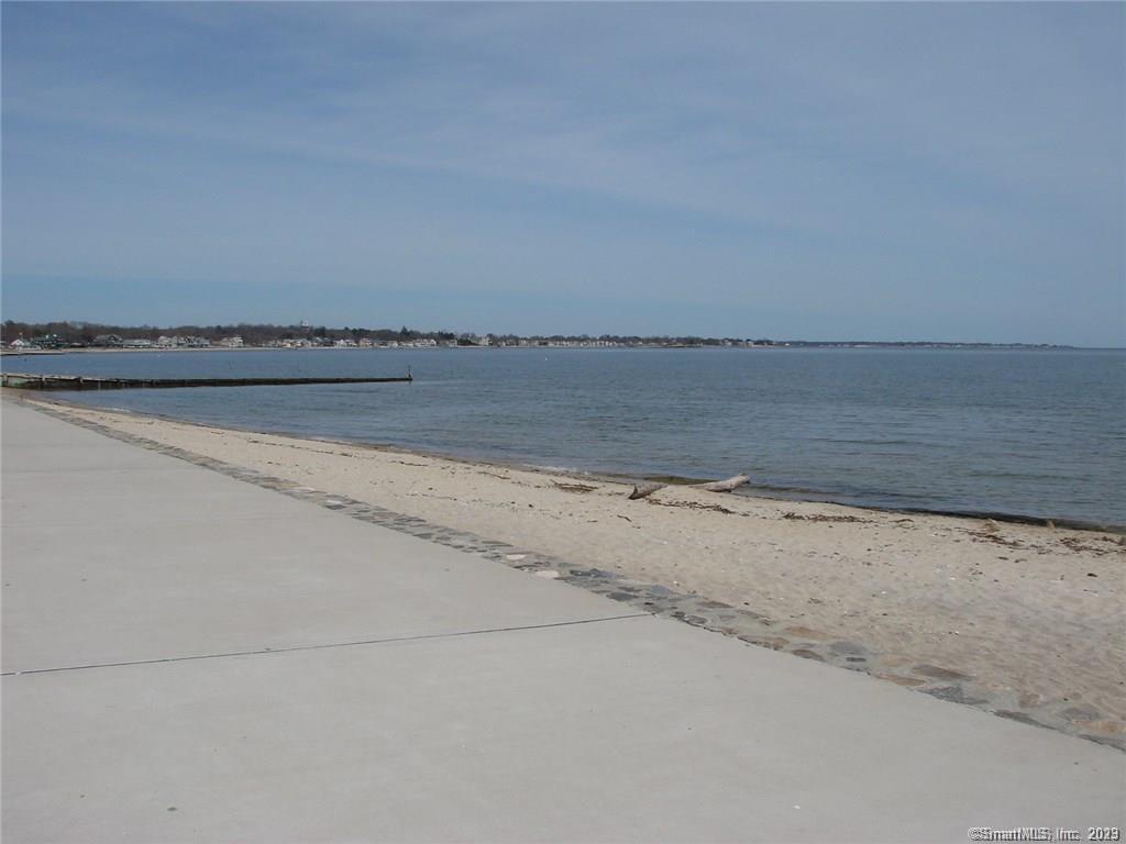 Summertime Fun awaits in this four bedroom cottage across from sandy beach on Long Island Sound. Large Eat-In-Kitchen, Enclosed front porch, waterviews, wifi, large sandy beach, outside shower, picnic table and ever-changing marsh views. Sorry no pets or smoking.