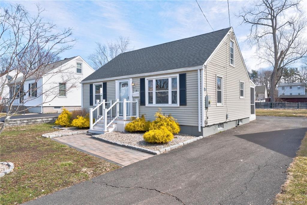 Cape style home , that has been remodeled. Updated kitchen with granite counters.  Kitchen leads out to a screened porch looking out to a level lot.Remodeled bathroom and refinished hardwood flooring.  Freshly painted interior, new carpeting in the upstairs bedrooms.