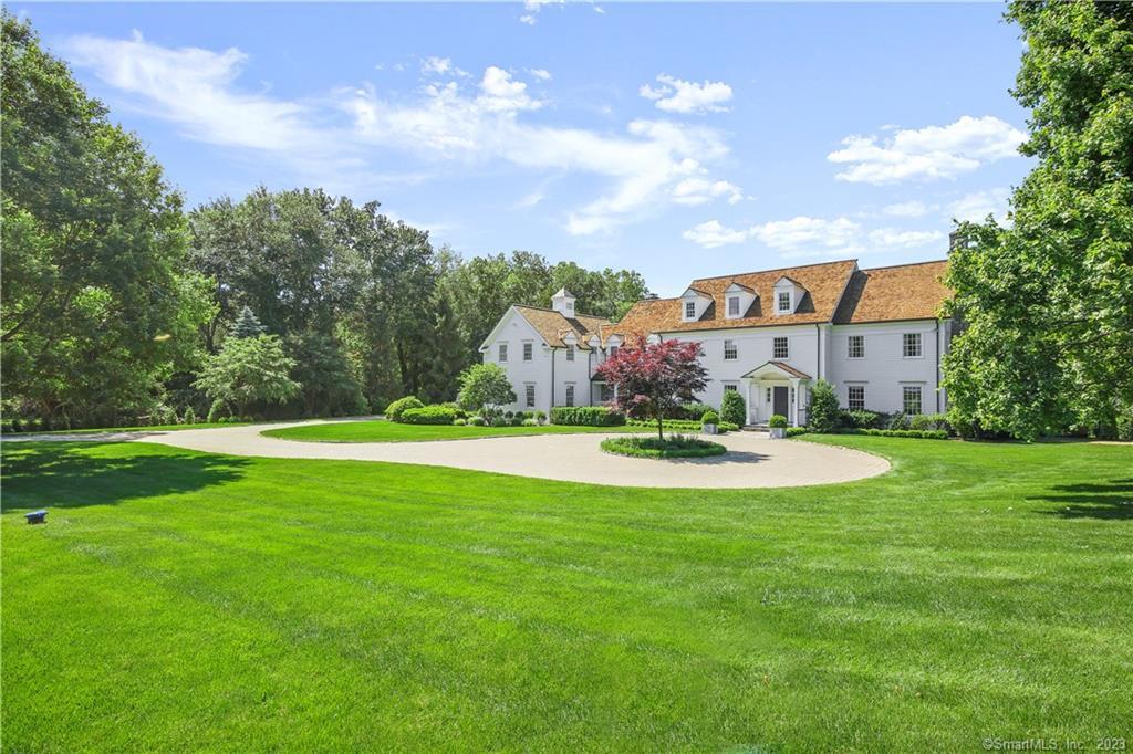 Short or Long Term Beautifully Furnished Rental. Located at the end of a private lane amongst 2 acres, this recently reimagined home provides 4 floors of well-designed living space, with an expansive bluestone patio with fire pit & outdoor seating overlooking the stunning gunite pool. Inside, the chicly designed spaces are made to feel homey & warm with natural light that fills each room. The first floor living room, family room, dining room, & office are anchored by the gourmet, eat-in kitchen complete with stainless steel high-end appliances. Upstairs are 3 en-suite bedrooms, a bonus office, a fitness room, & an impeccably designed, luxurious primary suite. On the third floor, a separate guest suite. The lower level offers a playroom, den, & storage space. Lease term minimum 3 months. Short Term $27, 000/month