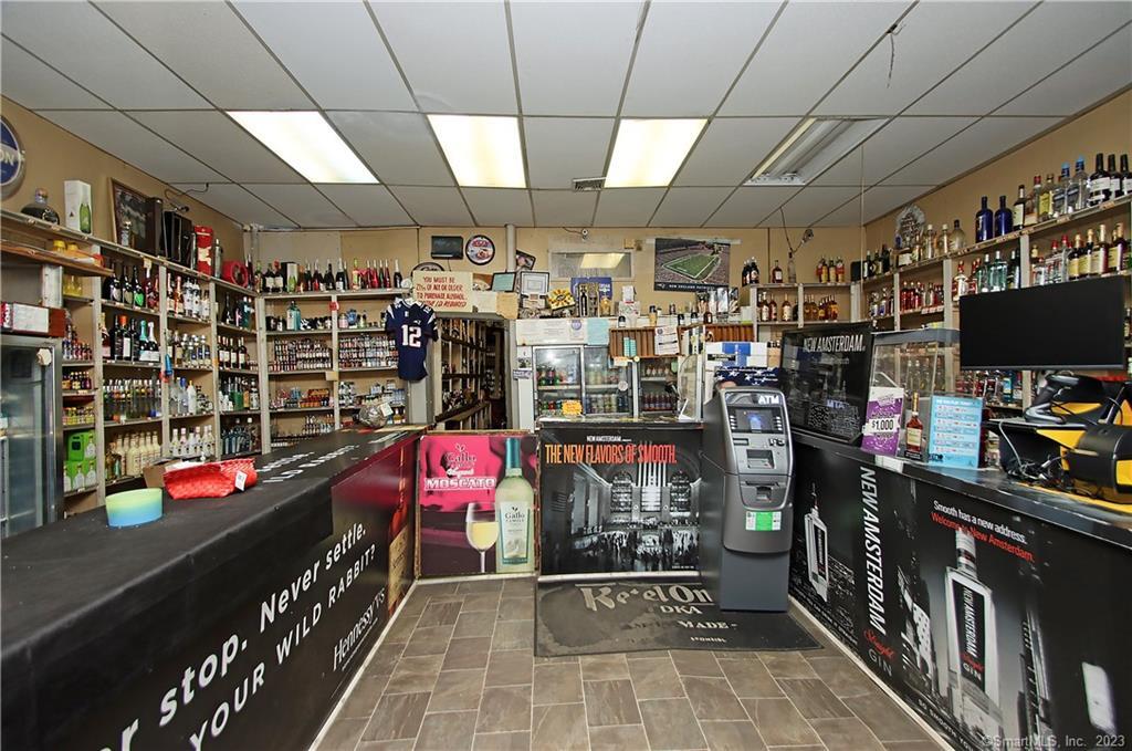 Here is your opportunity to own a store front that includes 3 rental apartments ((2) 1 Bdrm apartment; (1) 3 bdrm apartment. Currently a liquor/package store that includes all inventory in listing price (liquor, beer, soda, juice and cigarettes) Price also, include liquor and lottery licenses. This can be used as a multi-function property.