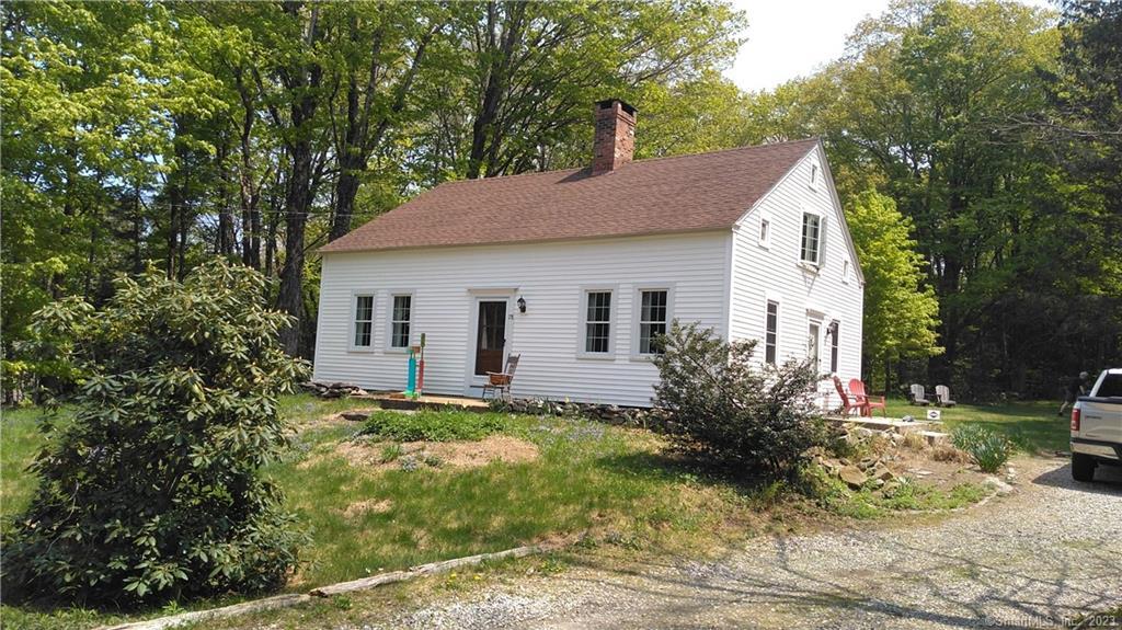 1818 Traditional center chimney Cape. Updated throughout with newer windows, siding and mechanicals, while continuing to maintain most of its original interior features including; 2 working fireplaces with a beehive oven, chestnut beams, and wide board floors that can't be duplicated. Grounds with stone walls. Live comfortably while enjoying this historic country setting.