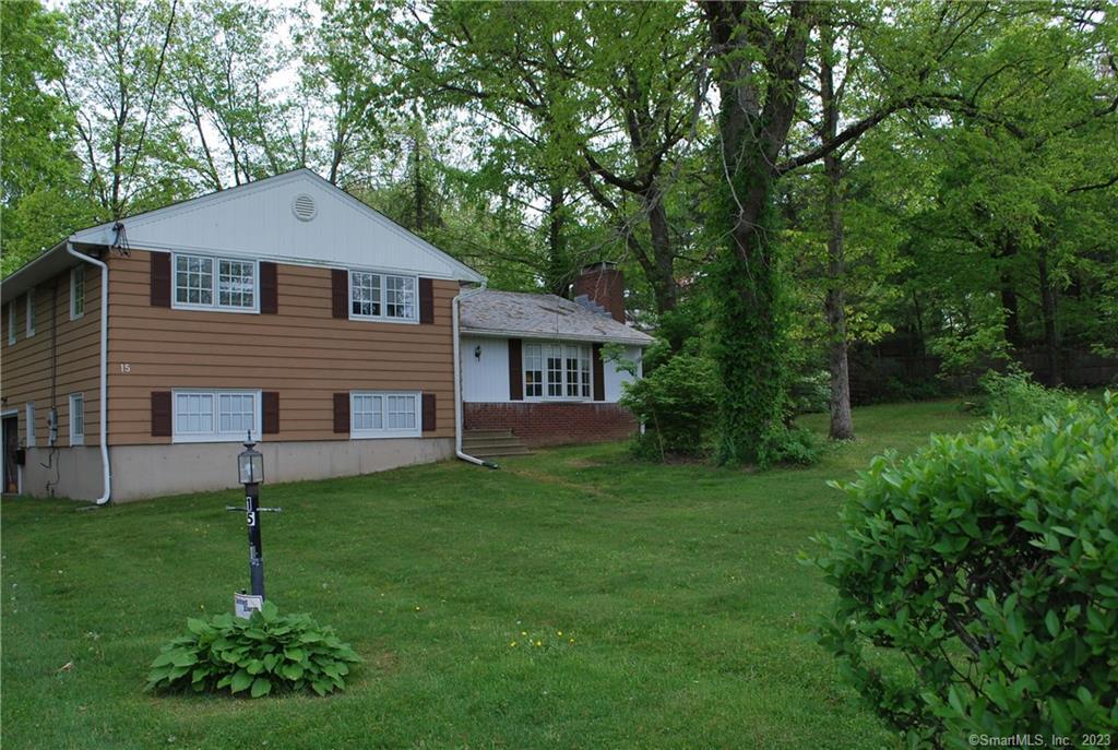 Watch the seasons change in this country home on 1 + acres in rural Woodbury with central air and a whole house generator. This three bedroom home offers many builtins. 3 levels of living space and a large yard for gardening or just relaxing on your private patio. Also a level drive way with a one car garage.