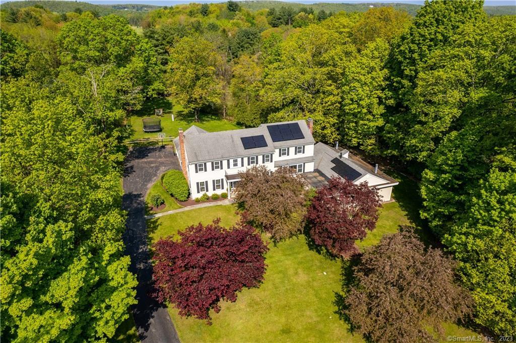 Move right into this spacious remodeled colonial with indoor pool & sauna featuring 5 bedrooms, 4 full baths and 2 half baths; abutting Simsbury Farms Golf Course and Recreation Center. Recently renovated most of the work has been done for you! This home is perfect for entertaining! The main floor features a pristine and spacious eat in kitchen, new cabinetry, quality stainless appliances, new dekton counterops, backsplash and flooring. Formal dining room flows into the family room with fireplace and living room with fireplace. An office with built ins and mudroom finishes out the main floor. The upper-level features five spacious bedrooms and three renovated full baths. The primary bath has heated floors! Partially finished lower level with half bath and wood stove that flows out to the indoor gunite heated pool and sauna. A full list of updates is attached. Just minutes to Simsbury Farms to enjoy just some of the amenities including four lighted tennis courts, two lighted paddle tennis courts, basketball court, outdoor ice skating and multiple outdoor pools. Floor plan is attached, Simsbury was recently named number two as the best place to live in Connecticut.