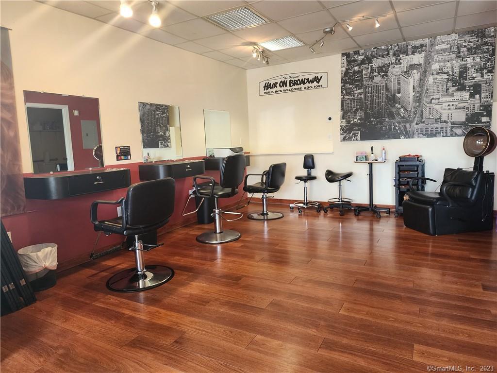 Fantastic opportunity to start your own salon without having to go through the expense of a new start up business. Walk into a fully set up salon in a great location! This store front in a busy shopping center offers high visibility plus ample parking. The salon is being rented fully equipped with 3 styling stations, a furnished reception area, mixing area, laundry and private bathroom. On Whitney Ave, on the corner of West Woods RD, and Mount Carmel Ave, right by QU and Sleeping Giant! HUGE traffic count, and thriving strip mall. Plenty of parking. There's gas heat, central air and a security system. Great potential to bring your own staff and/or rent out chair space to defray the monthly rent. Bring your supply's, and your staff....it's ready to go!