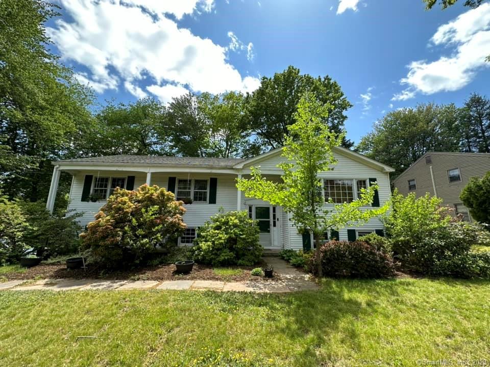 Look no more. Beautiful 3/4 bedroom 2.5 bathroom raised ranch on .4 acres in West Hartford.  Central Air-conditioning Living Room, Dining Room (currently used as home office) 3 Totally redone bathrooms, flexible floor plan with potential for an in-law suite, gym on lower level with special gym flooring. Great open floor plan. 2 car garage. Gorgeous deck. Separate laundry room. Family room (or could be 4th bedroom) downstairs.  Walk-out lower level. Beautiful lot just looking for your gardening touches. Easy access to restaurants, parks, golf, Westmoor Park.