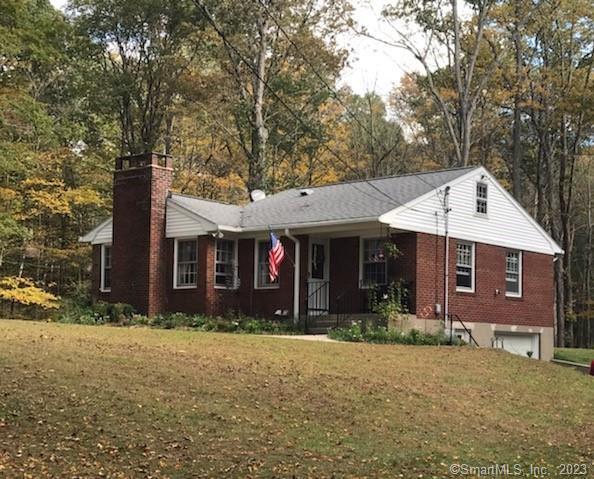 Three Bedroom brick home in quiet setting with hardwood flooring, kitchen with modern appliance and gas fireplace, living room with built-in shelving, master bedroom with full bath, two additional bedrooms with built-in cabinets, and full bath in main hallway. Pantry area with washer and dryer and breezeway to front porch. The lower level has a recreation / play room or additional storage area. The lower level is a walkout to driveway and interior access to the tandem garage. The grounds are well maintained, private and wooden with a stream nearby. Short distant to I 84 or Woodbury shopping district. Application, Credit / Criminal and Employment Verification required. An application fee of $45.00 is required for each household member.