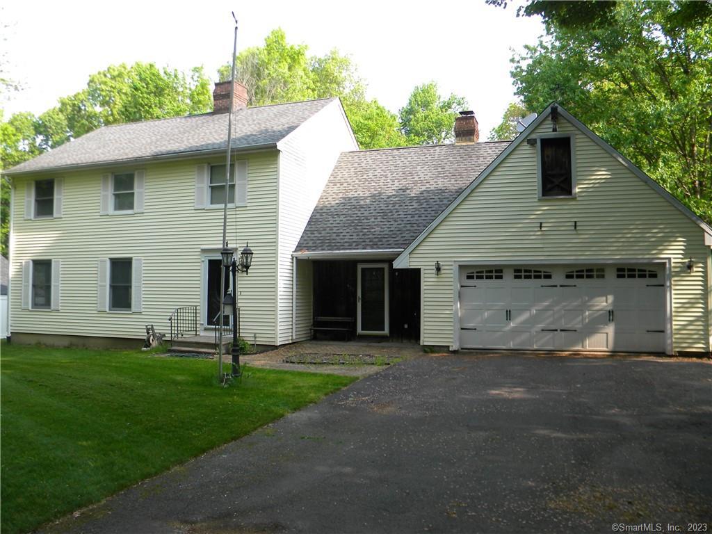 Plenty of room in this New England style colonial. Enjoy this large eat in kitchen along with a formal dining room with French doors to the living and an atrium door to a huge private back yard. The home has a fireplace in the living room and the Den. All hardwood flooring through out this home, central air, and large rear deck for outside gatherings !!