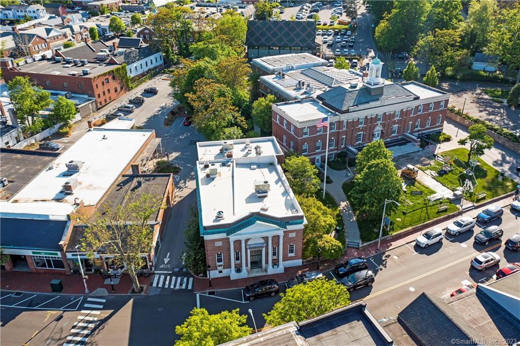 Historic 87 Main Street is looking for a new occupant to usher in its latest chapter. The Bank Building ground floor is a light filled retail space boasting just under 4, 000 sqft. This PRIME downtown New Canaan location is in the heart of the retail corridor, directly next to Town Hall, two blocks from the Train Station and surrounded by various shops, restaurants and amenities. Formally home to Thali's flagship location for 17 years, this space is a perfect restaurant venue but the versalite open layout, large windows and high ceilings offer a blank canvas for various retail uses. This space also comes with access to a large basement area with ample private storage.