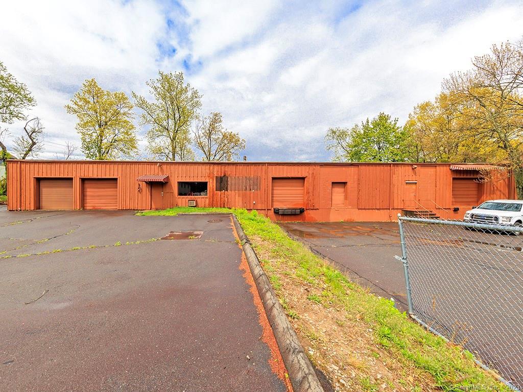 10, 000 sf in GI zone with very close Highway access for lease. This open span building can offer many possibilities. Contractor, storage, industrial facility, can be divided to offer tenant usage & more. 2 drive in doors, 2 loading dock height doors & plenty of parking. Building is also for sale