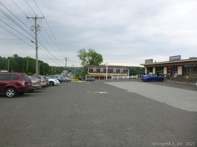 2 buildings62-68 Merrow Rd 14, 561 SF Acres: 2.13 Heating: Oil Public Water & Sewer Frontage: 195 Ft. Zone: TVA Taxes: $36, 521.48 Traffic Count: 6, 200 Year Built: 196470 Merrow Rd 5, 700 SF 2 Stories 4 Units Acres: 1.5 Heating: Elec Public Water & Sewer Frontage: 495 Ft. Zone: TVA Taxes: $18, 187.58 Traffic Count: 6, 200 Year Built: 1963