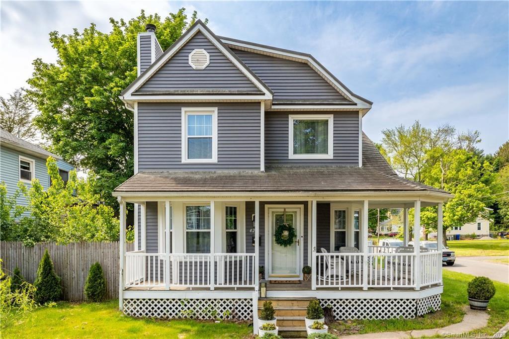 Updates and charm abound in this remodeled antique colonial! Built in 1906 this home boasts a wrap around front porch perfect for visiting friends on long summer nights. When it gets cold out, move into the welcoming den and warm up by the wood-burning fireplace while you watch the seasons change through the bay windows. The open floor plan and 9ft+ ceilings provide ample space to host holidays while the stained glass windows and built-in bookshelves in an intimate reading nook generously offer cozy privacy. 2020 saw the full remodel of the kitchen including a spacious island fit for 10 people! NEW furnace was installed 2020, NEW water heater 2023, and NEW windows are less than 6 months old with a transferable warranty. This home is so much more than 4 bedrooms and 2 full bathrooms. It's a piece of history with all the modern amenities you could ever need! Your search is over. You're home.