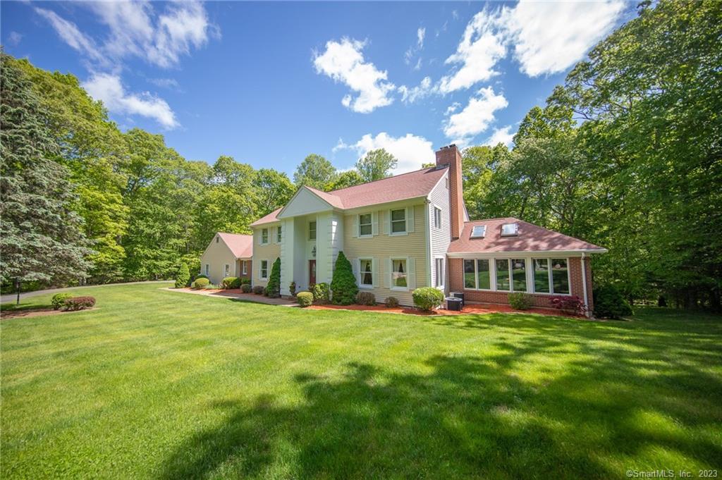 The 2-story grand foyer welcomes you into this gracious and spacious 5 bedroom, 3.5 bathroom colonial. The home is situated on private 3.69 acres in a quiet neighborhood setting at the end of a cul-de-sac. The gourmet kitchen beckons you into create wonderful meals for family and friends- loads of cabinets, center island, double ovens and a dining area that leads to an expansive 75 foot new deck overlooking the level, park-like grounds. The first floor is comprised by a huge formal dining room that can easily seat 12, living room with marble fireplace, great room with skylights and slider that open to the deck stretching the full length of the house, family room with brick gas fireplace and large laundry room. Second floor with 5 generous sized bedrooms. Primary bedroom with lots of closet space and remodeled bath with walk-in shower. Attic space with plenty of storage. Lower level basement with walkout doors and ceramic tile floors. Many great features abound here- hardwood floors throughout, forced/central air, Hunter 7 zone law irrigation system, Generac 22kw electric generator, floor to ceiling marble baths with Jacuzzi tub. Looking for a move-in ready home with tons of style and charm? This is it. Come take a look!