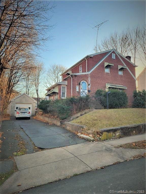 Don't miss this charming, solid all brick home nestled on a quarter acre of land. Large, level yard with brick patio great for entertaining or lots of toys for the family. Enter into the living room and your eye is drawn to the large fireplace and hardwood floors. Circle around to the large dining room and kitchen with an additional bonus room or office. Main bathroom and 3 large bedrooms upstairs and plenty of room for you to use your imagination in the partially finished basement. Also, on the lower level is a half bathroom and laundry hookups. Home needs your special touch and TLC. New Roof 2019, New Water heater 2020.Additional notes-Peeling paint in the bathroom. Due diligence on financing. Seller exercising a reverse contingency. Being sold As Is.