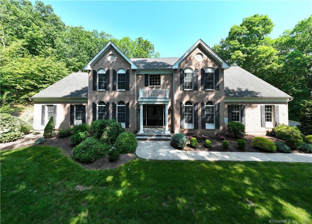 Stately Custom (5) Bedroom Colonial Home located in the prestiqious Feldspar Ridge neighborhood. The home has a renovated kitchen designed with an open concept, allowing for a spacious and inviting atmosphere. This layout promotes easy movement and interaction between the kitchen and adjacent areas. The family room is generously sized and features a central fireplace, which adds a cozy and focal point to the room. The cathedral ceiling creates an open and airy ambiance, enhancing the overall grandeur of the space. There is a private Office just off the Family Room to conduct business affairs or work remotely. The home includes a separate formal dining room, providing an elegant area for hosting dinner parties or enjoying family meals in a more sophisticated setting. The formal living room offers a dedicated space for receiving guests or relaxing in a more formal and refined environment. The Master Bedroom includes an ensuite bathroom, ensuring privacy and convenience for the homeowners. The finished lower level offers additional living space such as bedrooms, offices or recreational areas. The property boasts a private lot, allowing for seclusion and tranquility. It features a stone patio with a firepit and a stone BBQ thus providing an outdoor area for relaxation and entertaining outdoors. Overall, this custom home offers a blend of practicality, elegance, and outdoor amenities, creating a comfortable and appealing living environment.