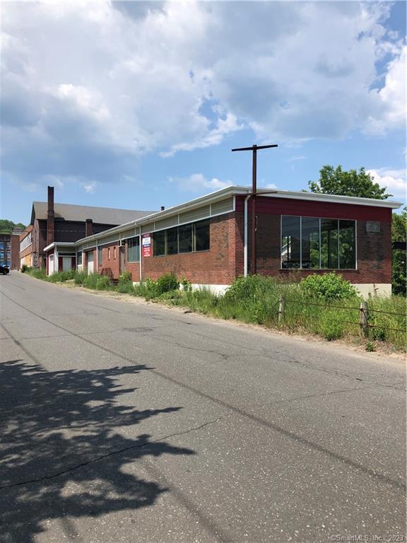 Outstanding Centrally Located Downtown Business District! 9, 000 +/- Sq. Ft. Commercial Facility. 4, 719 +/- Sq. Ft. on Main Level with Lower Level consisting of Multiple Garage Bays / Storage areas. Former uses were both Automobile & Boat Dealerships. Lots of Window Display in Main Level Showroom with Birds-Eye View of Busy U. S. Route #44 (Main Street). Current Owner has made Structural Improvements as well as a New Roof and Exterior Trim work. Very Visible Corner Lot Location - Offers Good On-Site Parking. Ideal Potential Here! Needs Visionary Individual(s) with Right Market Concept to Transform this property.