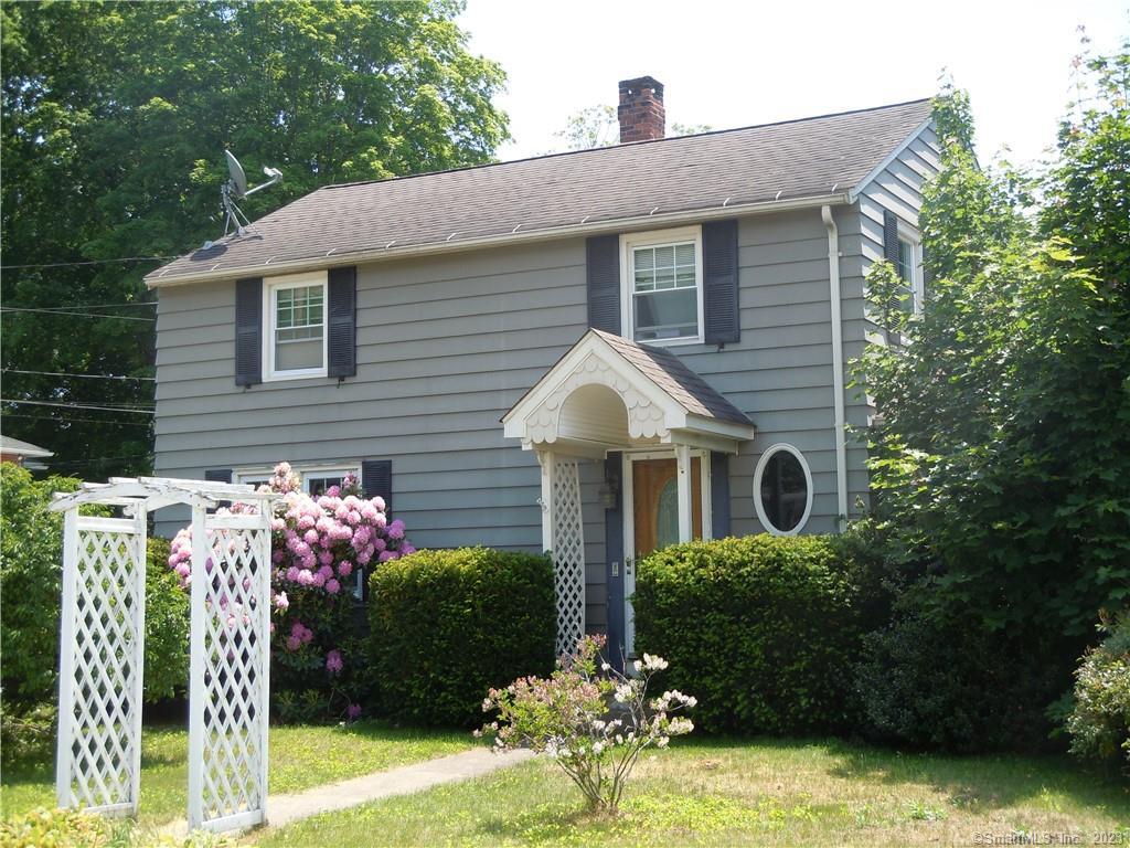 Attractive Colonial off of High St. 1466 Sq. ft. plus a partially finished basement area. Large living room, lots of kitchen cabinets, first floor Sunroom for potential office or additional bedroom. Oak flooring throughout, vinyl insulated windows, covered back porch overlooking the yard. Garage with additional storage area, with porch. Level lot, city sewers and water, quiet side street location.