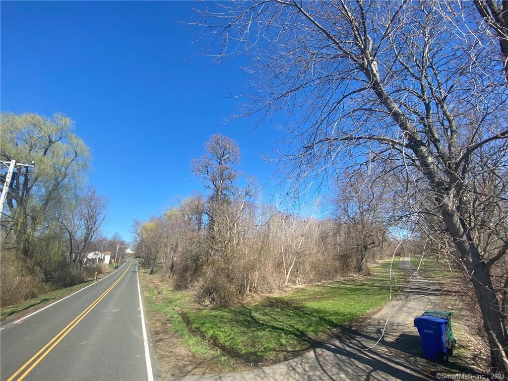 Approved 1+ acre building lot. Perfect opportunity to build your own home on this level, slightly wooded lot in a quiet setting. Near so many amenities and close to Bradley International Airport and I-91. In 2005 there was a 2 family home on this property which was taken down.