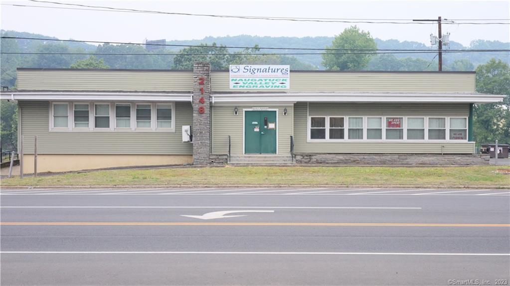 Enterprise zone opportunity for a 7, 252 sq.ft. building located next to route 8 and interstate highway 84 in Waterbury, CT. The estimated traffic passes the building is 6, 600 per day. Building is CG zoned, includes ample parking, loading dock, 10-foot ceilings, 4 overhead doors, front office, multiple bathrooms, and a large basement.