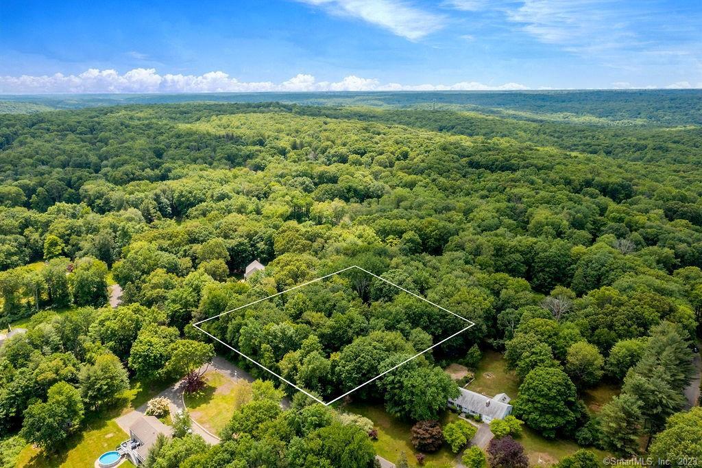 Incredible opportunity just 60 miles from NYC, minutes to the Redding train station and easy up or down county commute on RT7 or 53. Welcome to 48 White Birch Rd a gorgeous 2-acre lot of land that combines natural beauty, serenity, and endless possibilities. This rare parcel is now available for the first time, offering you the chance to build your dream home in one of Connecticut's Best Small Towns with an award winning public school system. Nestled in an established and charming neighborhood, this lot embodies the perfect blend of tranquility and convenience surrounded by lush greenery, mature trees, and picturesque landscapes. Embrace the small-town ambiance while still being conveniently located near major cities. Redding is just a short drive away from Danbury, Stamford, and even New York City, offering easy access to a wide range of amenities, shopping, dining, and entertainment options. This 2-acre parcel boasts ample space, providing you with the freedom to design and construct the home you've always envisioned. Don't miss your chance to create the home and lifestyle you've always dreamed of in this idyllic setting. Minutes to Topstone Park, a great place to swim in the summer, along with picnicking, hiking, kayaking and nature study. Opportunities like this are rare, so seize the moment and make this ideal spot yours today. Contact listing agent for more information or to be connected with a local builder that can help turn your dreams into reality!