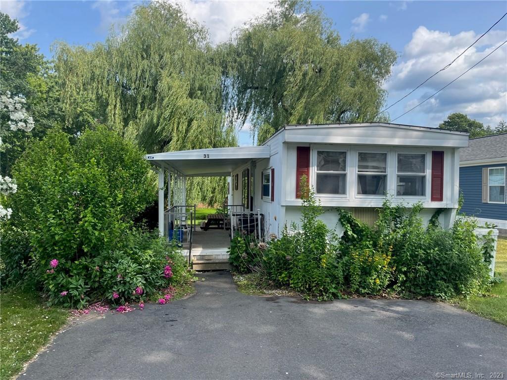 Mobile home at Cedar Springs West a 55+ Sun Community directly on Quinnipiac River. This home has two bedrooms, covered porch and a newer heating system! Sold AS IS- Subject to approval by Sun Communities