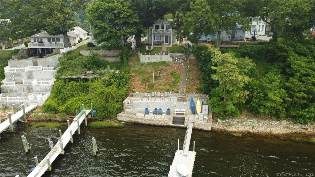 Updated beautiful home on the waterfront with Dock and mooring. 3 bedrooms, 2 full baths, balcony off the Primary Bedroom overlooking the water. Gas fireplace in the living room, lifetime metal roof, built in jacuzzi in the basement and much more.