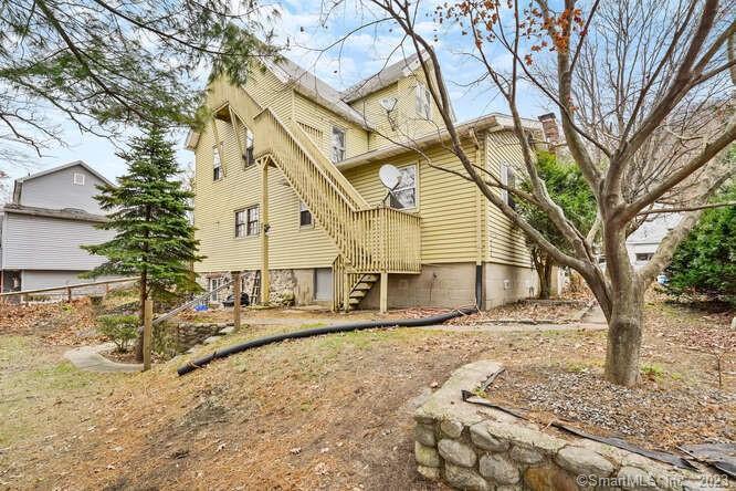 This spacious two-family home is situated in a neighborhood in Naugatuck. The first floor offers three bedrooms and is currently vacant, while the second floor, with three bedrooms as well, is occupied by a tenant. The property features a pleasant yard.Located within a 5-mile radius , you'll find a range of convenient amenities nearby. Grocery stores, restaurants, shopping mall and many more!!There is a hospital in close proximity, ensuring easy access to medical services. Additionally, there are parks where you can enjoy outdoor activities, and nearby bus stops provide convenient public transportation options. BOOK A SHOWING NOW!!!!