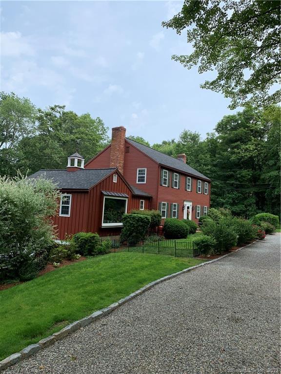 Wonderful family home surrounded by nature as the property backs up to 27 acres of town owned land. Living room with fireplace and many built-ins. Extremely large formal dining room with a fireplace and beautiful hardwood floors. Renovated huge kitchen with granite counter and pantry and generous sized eating area. Laundry room is just minutes away from the kitchen to make for easy work.  Adjacent family room features a fireplace and random pegged hardwood flooring. Master bedroom with new bathroom and huge walk-in closet. Additional three bedrooms can accommodate queen sized beds. Finished lower level with walk-out to the backyard includes full house Generac generator, outdoor TV for your enjoyment when grilling or using the Primo smoker built into a custom stone base with granite countertops on a beautiful expansive patio and covered porch for outdoor entertaining. Slate Patio and porch with low maintenance Azek and composite decking. The pond brings many hours of enjoyment from bird watching to feeding the goldfish. The beautiful stone wall in front faces the 9th hole of Smith-Richardson and is easy walking distance to the clubhouse and Boca Grill, a golfers dream. Minutes from the parkway and shopping.