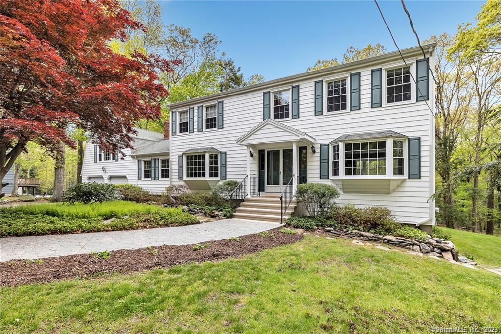 This highly desirable colonial home is designed to accommodate everyone's needs. The well-thought-out floor plan seamlessly connects the eat-in kitchen with custom cherry wood cabinets and Corian countertops to the formal dining room and spacious family room. The family room is a haven of natural light and warmth, featuring a charming wood-burning fireplace, perfect for cozy winter evenings. It also provides access to an additional playroom located above the garage, complete with a wood-burning stove. This versatile space can serve as an office, guest room, or any other space that suits your needs. On the second floor, you'll find four generously sized bedrooms, each with ample closet space and newly refinished hardwood floors. A full bath is in the hallway to accommodate the 3 hallway bedrooms. The large primary bedroom offers a private en suite bathroom and a walk-in closet, providing a tranquil retreat within the home. If you require extra space, the walkout lower level presents two finished rooms that can be tailored to your preferences, in addition to an abundance of storage options. Available August 1!