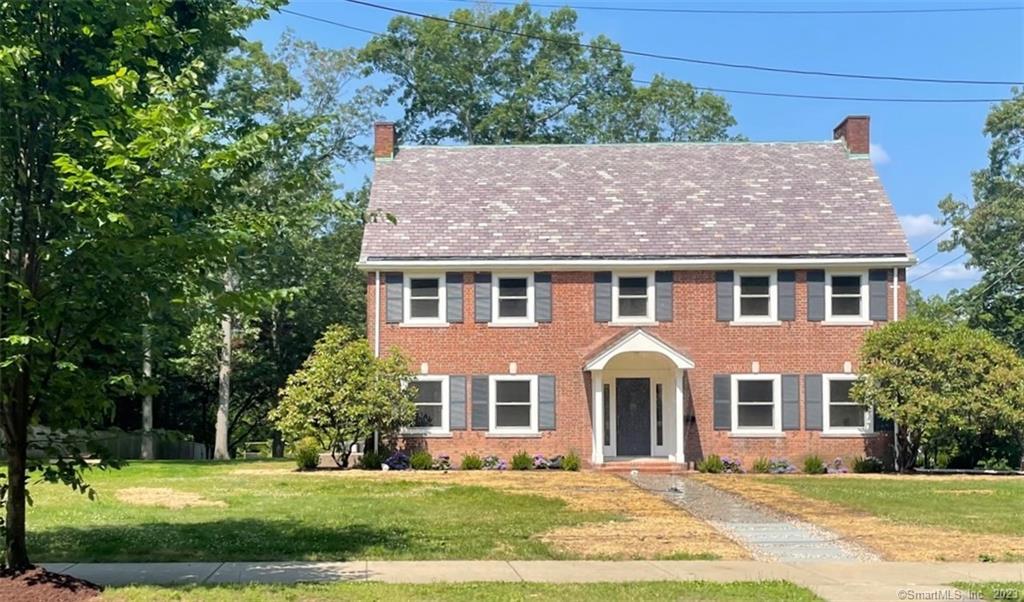 Outstanding renovation of this beautiful brick Georgian colonial on almost an acre of land close to Yale, East Rock+Edgerton Parks. The house is designed w/a perfect blend of old+new. Spectacular new kitchen, baths, heat, CA, thermopane windows, lighting, refinished flrs make this home ready to move right in. The elegant entry has a sweeping curved staircase + large openings to the LR+DR. The formal LR has a FP + glass French doors that lead to a magnificent heated sunroom w/2 walls of Palladian windows. The sunny DR offers a FP+a large opening to the chef's kitchen, with white cabinets, Quartz counters, SS appliances, a glorious breakfast nook w/ custom built-in banquette + great work + storage spaces. A separate spacious mudroom has closet space + a built-in desk area. There is a 1/2 bath+glass doors to a large stone terrace which overlooks the grounds. The primary suite has a sitting room, BR area w/a wall of windows overlooking the back yard, a walk-in closet + a true spa-like bathroom w/a large double vanity, huge shower, free-standing tub + radiant heat. There are 3 add'l BRs on the 2nd floor, 2 more full baths+an enormous laundry room w/tons of storage. A few stairs lead to a huge great room + half bath ideal for a library, office or playroom. The spacious finished 3rd fl is a stunning space w/a vaulted ceiling + exposed brick. The back yard has mature trees + lots of room for play + gardening. You'll appreciate the design of this one-of-a-kind Prospect Hill home.