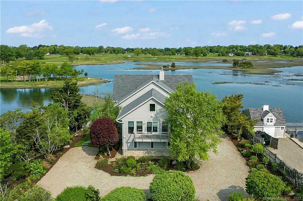 Spend your winter in the comfort of this Nantucket style home surrounded by water views of both the Long Island Sound and the estuary bordering the Shorehaven golf course. Every room in this fabulous house has a water view! Soak yourself in Mother Nature's expression of sunsets and sunrises. Then take a walk on the beach or sit by a roaring fire and relax. Paddle boarding, kayaking and fishing are available.