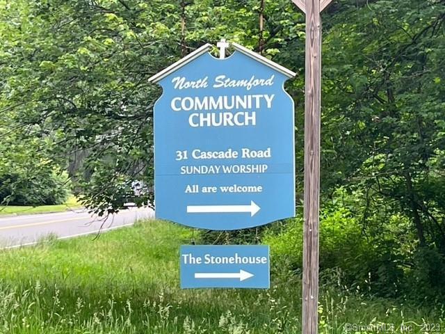 The landmarked North Stamford Congregational Church with its impressive facilities and amenities, is an ideal location for various events and gatherings. In the Stonehouse is a stage and seating for 150 theater-style, providing a suitable space for performances, presentations, and other similar activities. The finished lower level with a kitchen adds versatility, making it convenient for hosting receptions or serving meals during events. The lower level can also be used for childrens's ministry and can hold 40+ children.Additionally, the chapel, featuring a sanctuary with seating for 150, offers a more intimate setting for religious ceremonies, weddings, or other special occasions. If looking for additional space for children in the Guild House located behind the sanctuary that facility holds 12-15 children for Sunday School - only available on Sunday. The inclusion of utilities, parking, and ground maintenance in the rental package further simplifies the process for potential tenants.